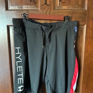 Hylete Black Performance Pants with Red and Blue Accents